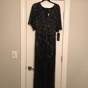 Sequin V Necked Dress with flowy sleeves NWT